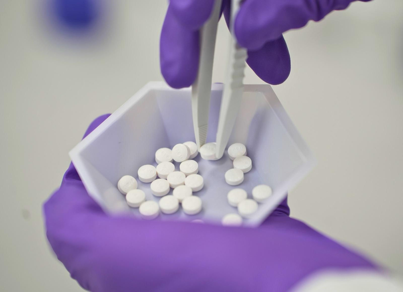 Wegovy tablets (oral semaglutide) with the NOVO imprint being counted in a pharmacy dispensing tray